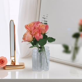 A set of 9 connected tube vases