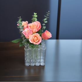 A set of 16 connected tube vases